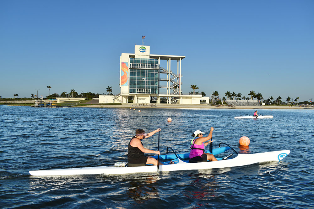 Outrigger canoes on the water at Nathan Benderson Park